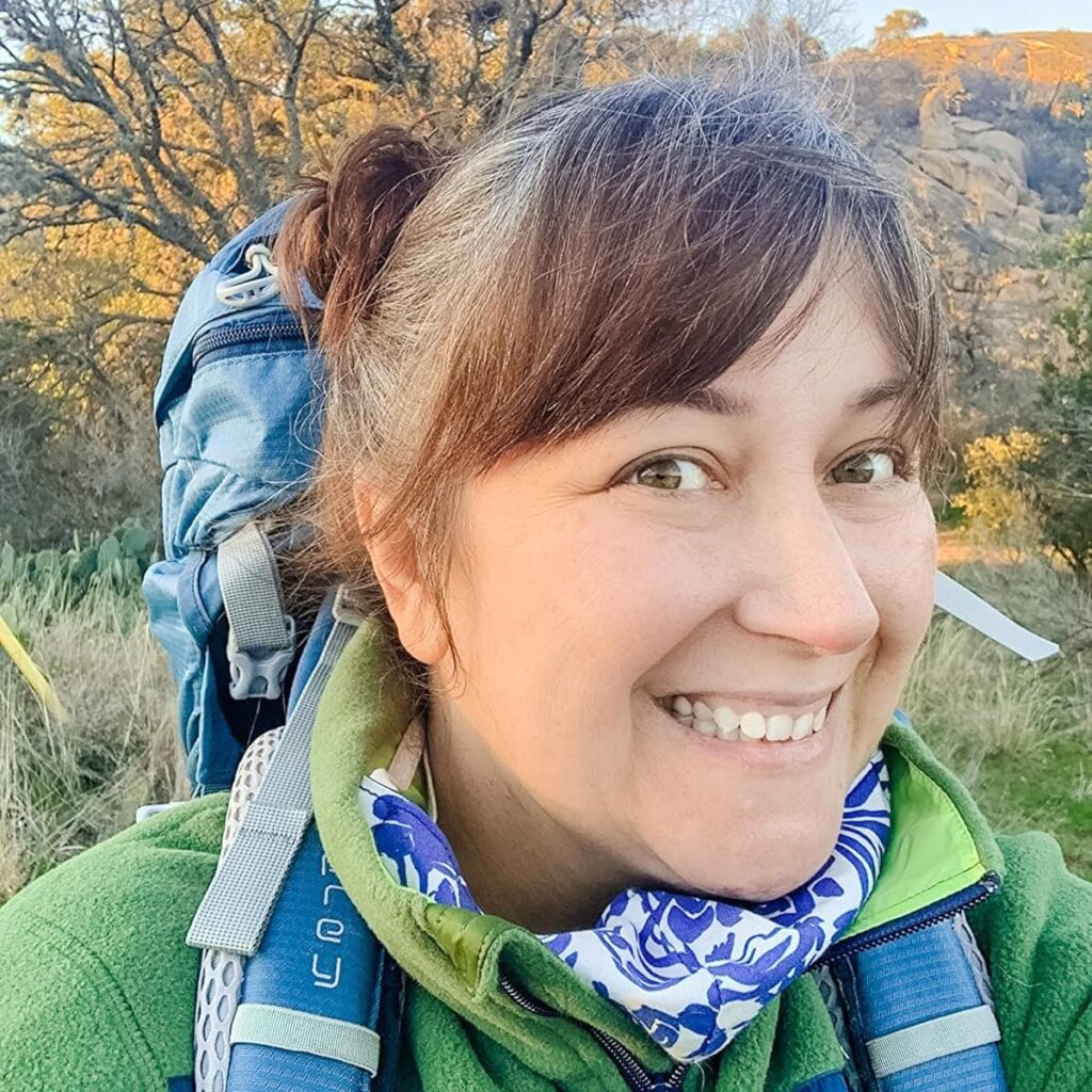 Woman backpacking and hiking.